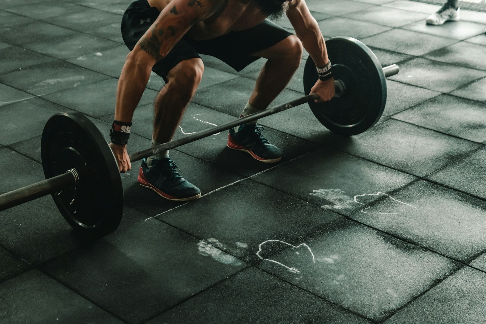 Worker on artificial turf